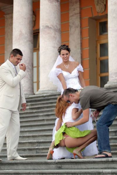 Drunk Bridesmaid Turns Cheeky in Wedding Photos
